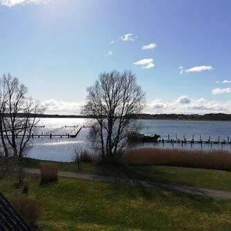 Апартаменты Ferienbungalow Mit Terrasse Und Seeblick In